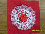 Square won by Minx41 in the Australia Bushfire fund-raiser auctions. A cream lace round, edged with cream & red heart lace, and finished with red...