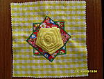 Yellow & white gingham square, with 2 small foral squares set crossways to each other finished with large yellow satin rose in centre. Replacement...